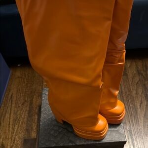 Vibrant Orange Knee-High Boots